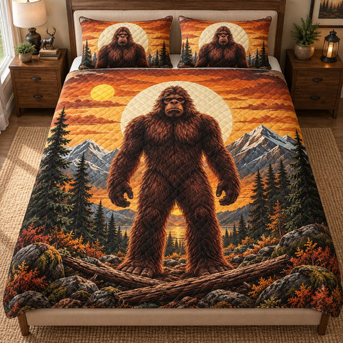 Front view of autumn Bigfoot mountain quilt set with orange sky and diamond stitching