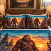 Angled view of sunset bigfoot forest quilt set rustic bedding gift for sasquatch fans with matching shams