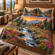 Angled view of sunset wildflower cabin quilt set showing quilt side drape and matching shams