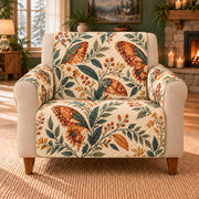 Ember Botanical Wings sofa cover on a beige armchair