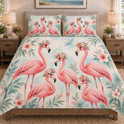 Floral Flamingo Tropical Garden quilt set displayed on a bed with coordinating pillow shams
