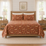 Warm terracotta dachshund and meadow daisy quilt set, front bedroom view