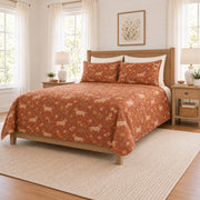 Warm terracotta dachshund and meadow daisy quilt set, right angle view