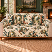 Garden Portal Leaves sofa cover on a beige sofa