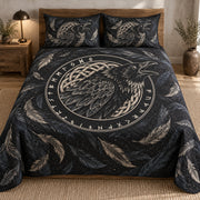 Odin raven charcoal and ivory quilt bedding set with matching printed shams, front styled mockup