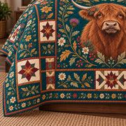Highland Cow quilt border detail with botanical and heritage patchwork motifs