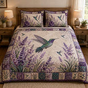 Purple Hummingbird Lavender Garden quilt design with coordinating pillow shams
