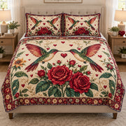 Hummingbird Rose Love quilt design with coordinating pillow shams