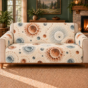 Impact Basin Rosettes sofa cover on a beige sofa