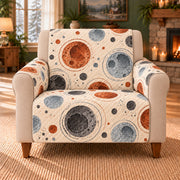 Lunar Crater Ovals sofa cover on a beige armchair