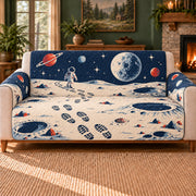 Lunar Footprint Trails sofa cover on a beige sofa