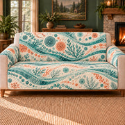 Microalgae Current Bands sofa cover on a beige sofa