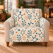 Molecule Sprig Repeat sofa cover on a beige armchair