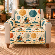 Moon Landing Motif Row sofa cover on a beige armchair