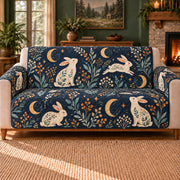 Moon Rabbit Seed Sprigs sofa cover on a beige sofa