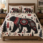 Nordic Black Bear Forest quilt set displayed on a bed with coordinating pillow shams