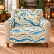 Ocean Current Bands sofa cover on a beige armchair