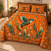 Orange hummingbird feather quilt set angled view