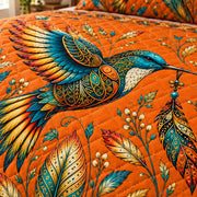 Hummingbird quilt print and diamond stitching detail