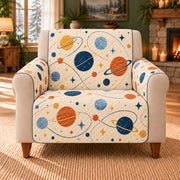 Orbit Loop Meadow sofa cover on a beige armchair