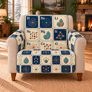 Periodic Element Tile Rhythm sofa cover on a beige armchair