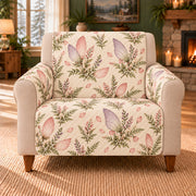 Petalwing Sprig Dance sofa cover on a beige armchair