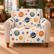 Planet Orbit Repeat sofa cover on a beige armchair