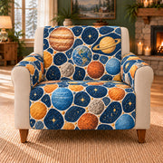 Planet Pebble Mosaic sofa cover on a beige armchair