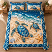 AI mockup, high centered overhead view of two sea turtles on golden sand with shells, starfish and a blue ocean wave border, quilt and two matching printed pillowcases in a neutral bedroom.