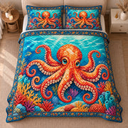 AI mockup, high centered overhead view of a bright orange octopus with curling tentacles amid colorful coral in turquoise water, quilt and two matching printed pillowcases in a neutral bedroom.