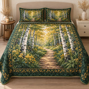 AI mockup, front view of a sunlit path winding through a green birch forest with a dark green leafy border, quilt and two matching printed pillowcases in a neutral bedroom.