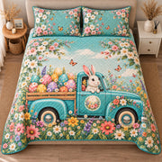 AI mockup, high centered overhead view of a white bunny in a teal vintage pickup loaded with colorful Easter eggs amid spring flowers, quilt and two matching printed pillowcases in a neutral bedroom.