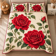 AI mockup, high centered overhead view of large red roses, buds and green leaves on an ivory botanical background, quilt and two matching printed pillowcases in a neutral bedroom.