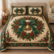 AI mockup, front view of a golden bell beneath a green bow in a holly wreath on cream with a green floral border, quilt and two matching printed pillowcases in a neutral bedroom.