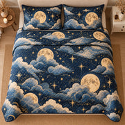 AI mockup, high centered overhead view of golden full and crescent moons among stars and blue clouds on navy, quilt and two matching printed pillowcases in a neutral bedroom.