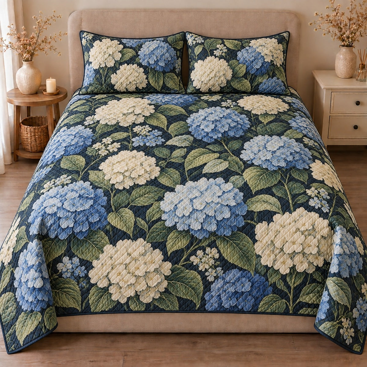 AI mockup, front view of blue and white hydrangea clusters with green leaves on navy, quilt and two matching printed pillowcases in a neutral bedroom.