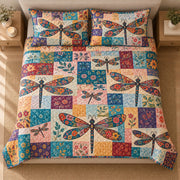 AI mockup, high centered overhead view of large dragonflies with colorful patchwork wings over floral quilt squares, quilt and two matching printed pillowcases in a neutral bedroom.