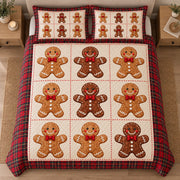 AI mockup, high centered overhead view of smiling gingerbread cookie figures in cream patchwork squares with a red plaid border, quilt and two matching printed pillowcases in a neutral bedroom.