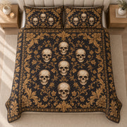 AI mockup, high centered overhead view of ivory skulls framed by ornate golden botanical scrollwork on black, quilt and two matching printed pillowcases in a neutral bedroom.