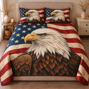 AI mockup, front view of a bald eagle over a red, white and blue American flag, quilt and two matching printed pillowcases in a neutral bedroom.