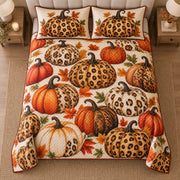 AI mockup, high centered overhead view of orange, ivory and leopard print pumpkins with autumn leaves, quilt and two matching printed pillowcases in a neutral bedroom.