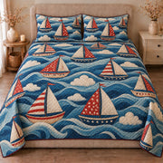 AI mockup, front view of sailboats with red, white and blue sails over stylized rolling blue waves, quilt and two matching printed pillowcases in a neutral bedroom.