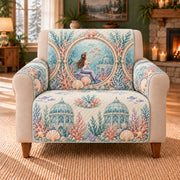 Reef Observatory Windows sofa cover on a beige armchair