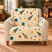 Rocket Orbit Links sofa cover on a beige armchair