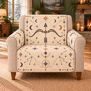 Sagittarius Bow Geometry sofa cover on a beige armchair