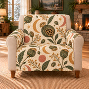 Seedpod Crescent Toss sofa cover on a beige armchair