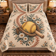 Front view AI mockup of the Softball Seam Garden quilt set with a yellow softball, glove, bat and daisies, with two matching pillow shams.