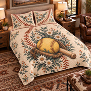 Elevated left-angle AI mockup of the Softball Seam Garden quilt set showing the thin diamond-quilted coverlet and matching pillow shams.