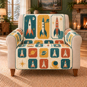 Spaceport Ticket Tiles sofa cover on a beige armchair