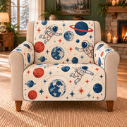Spacesuit Pocket Motifs sofa cover on a beige armchair